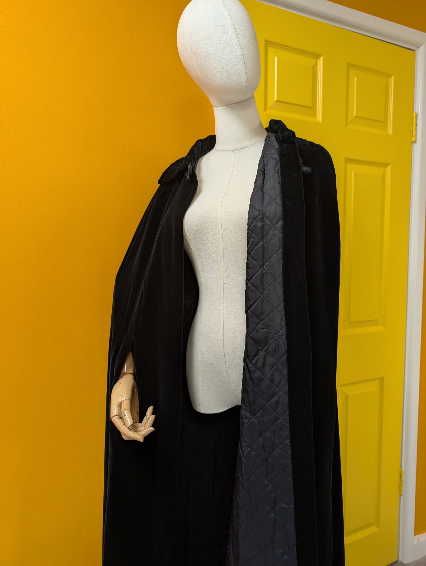 1970s Quad black velvet quilted cape
