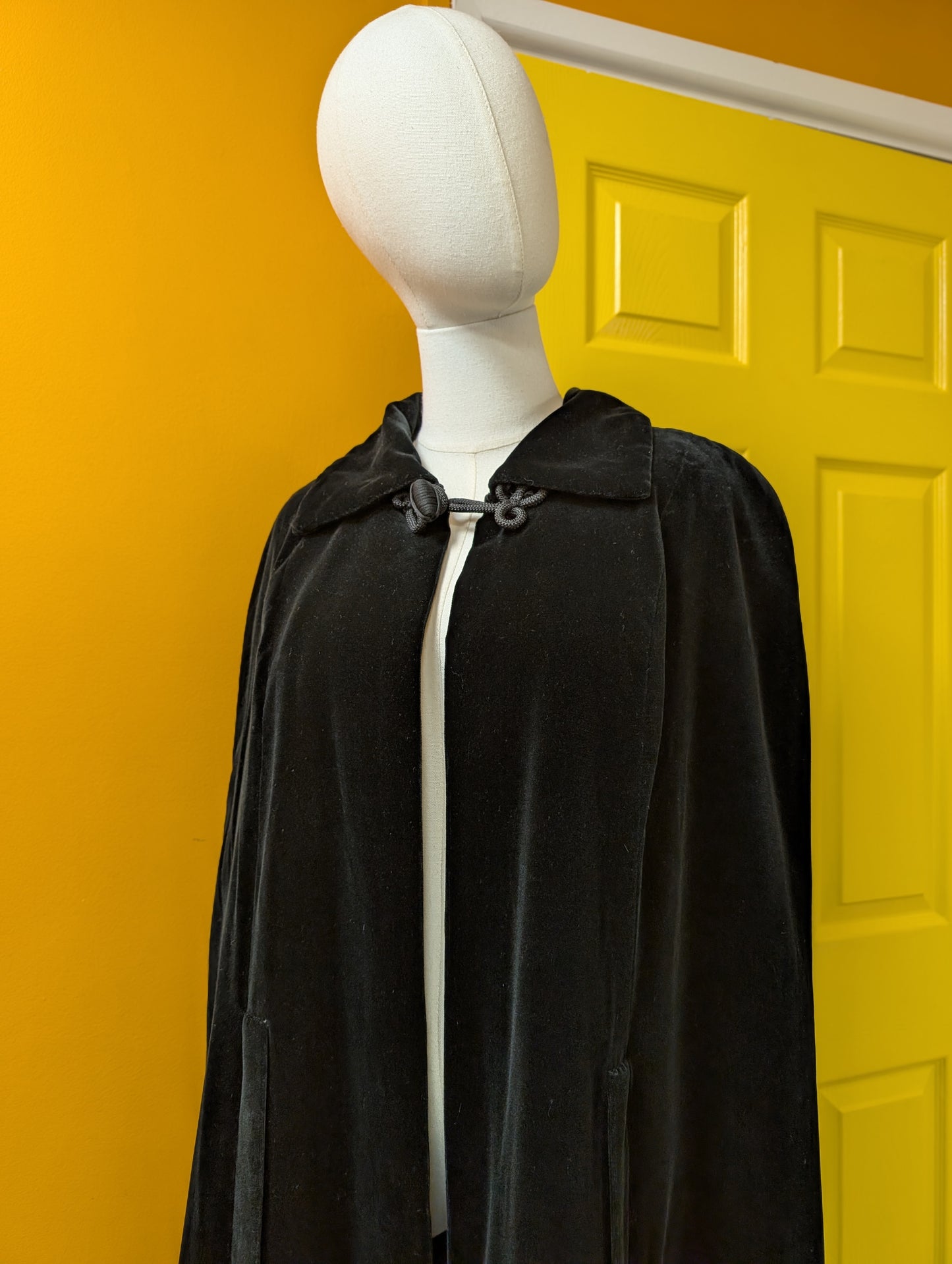 1970s Quad black velvet quilted cape