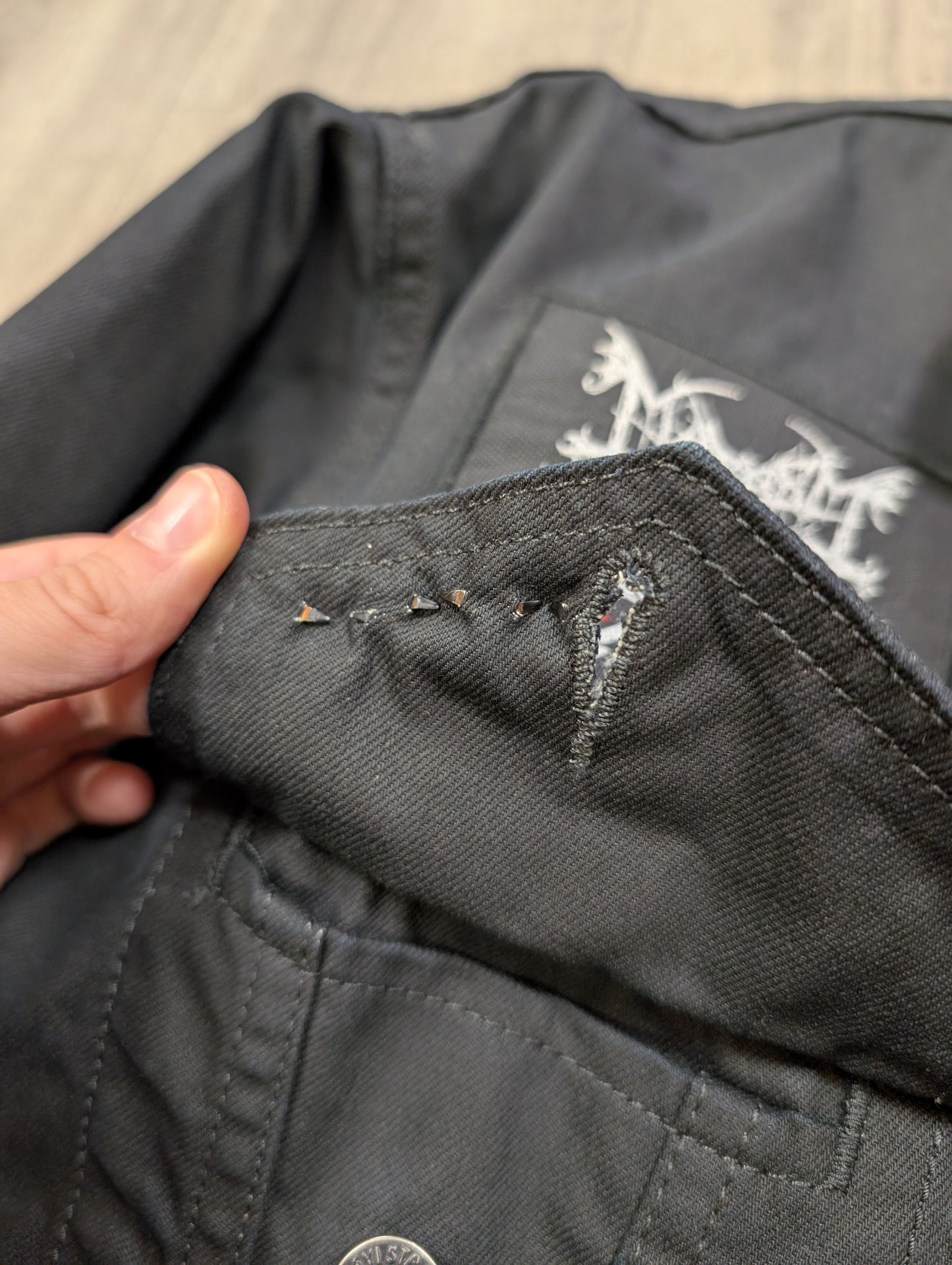 Customised Levi's jacket with band patches