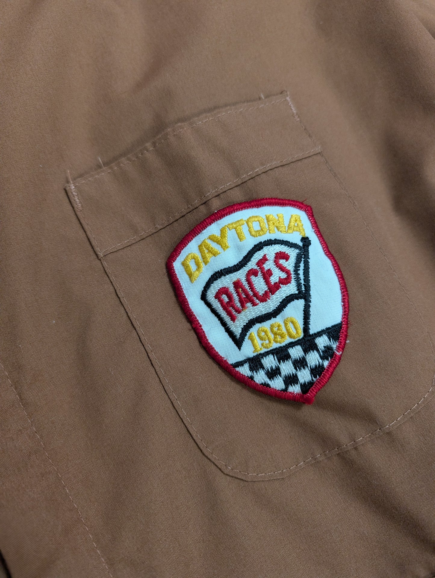 1970s Wrangler brown overalls with Daytona Races 1980 patch