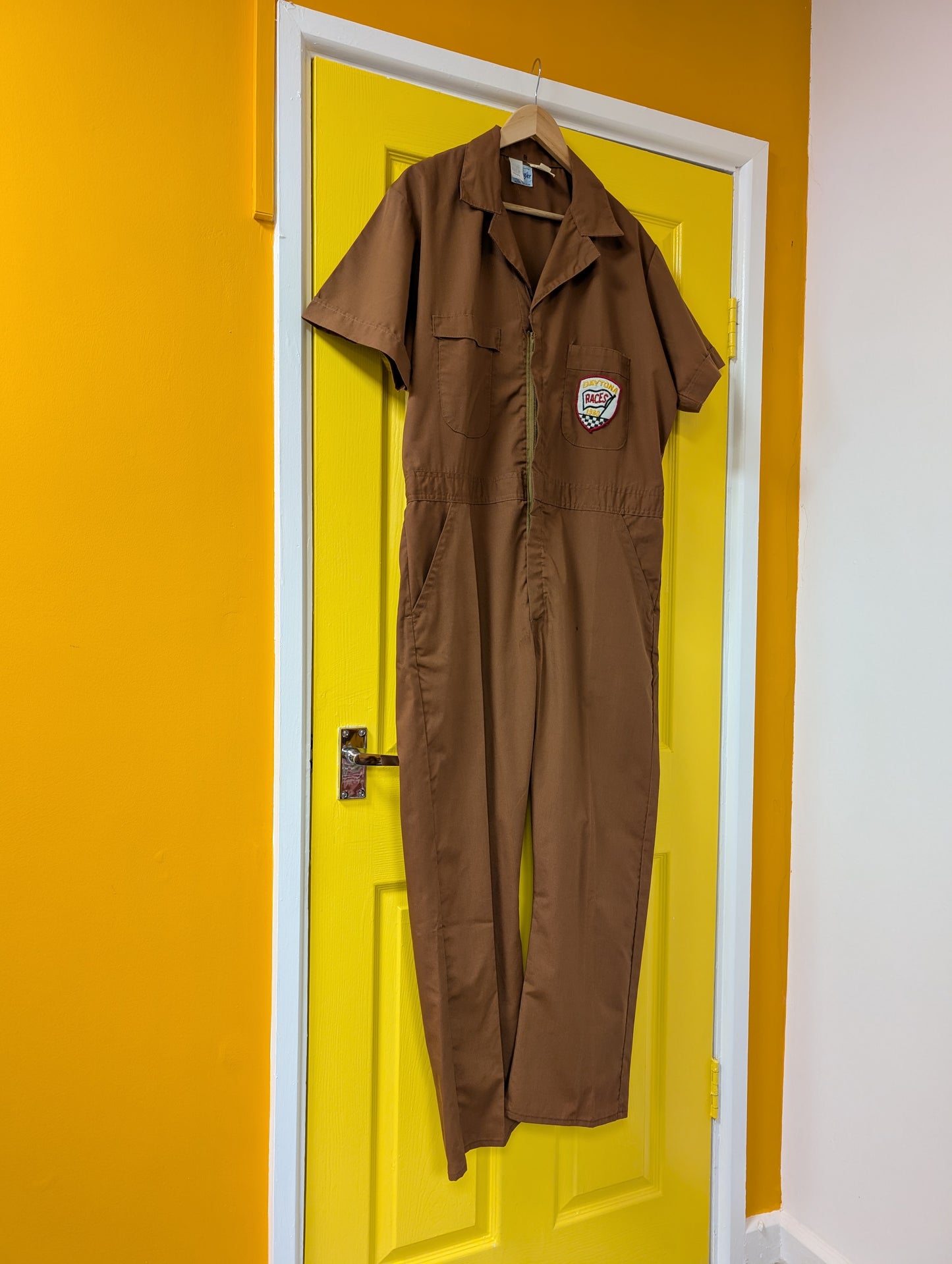 1970s Wrangler brown overalls with Daytona Races 1980 patch