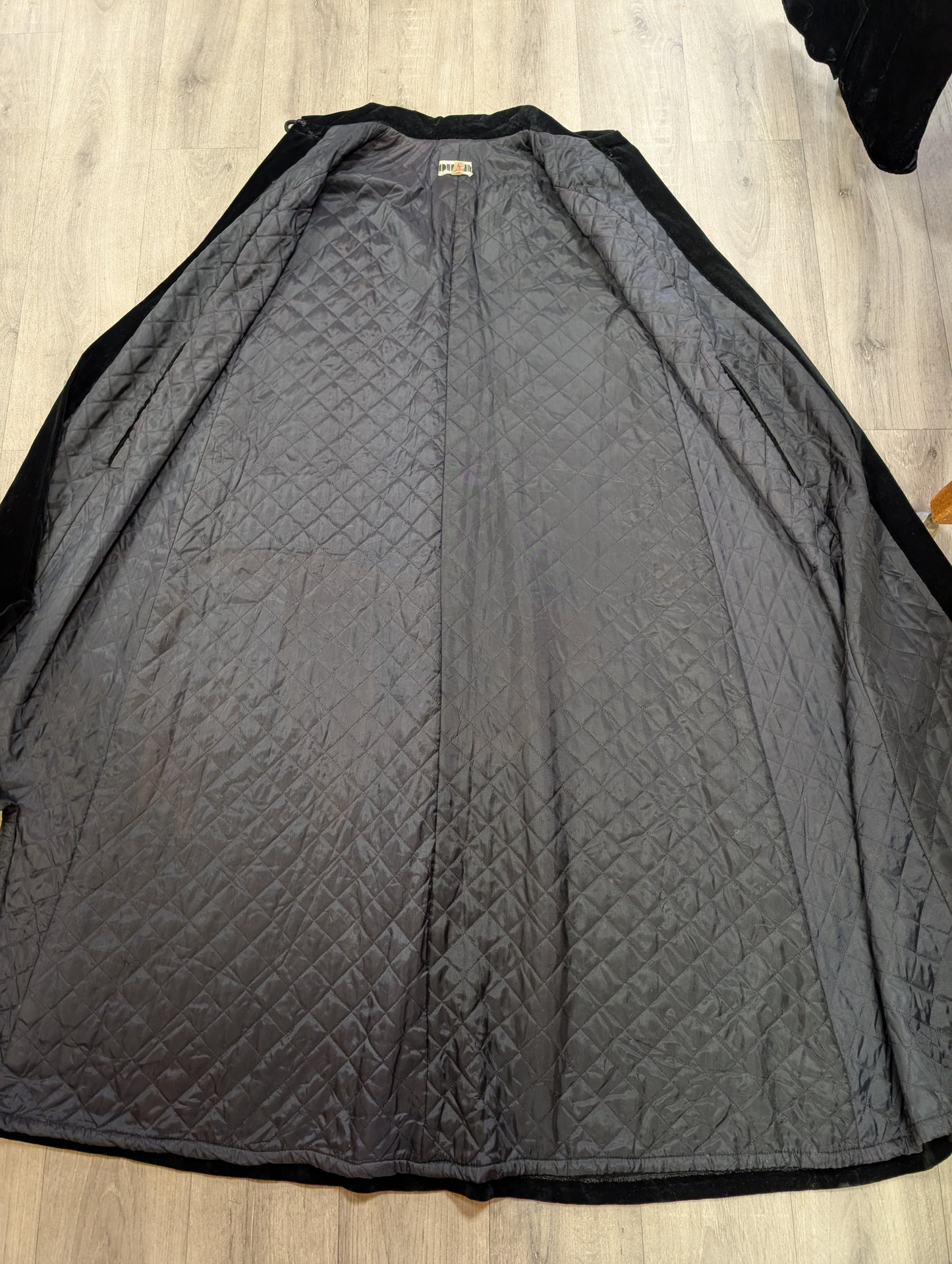 1970s Quad black velvet quilted cape