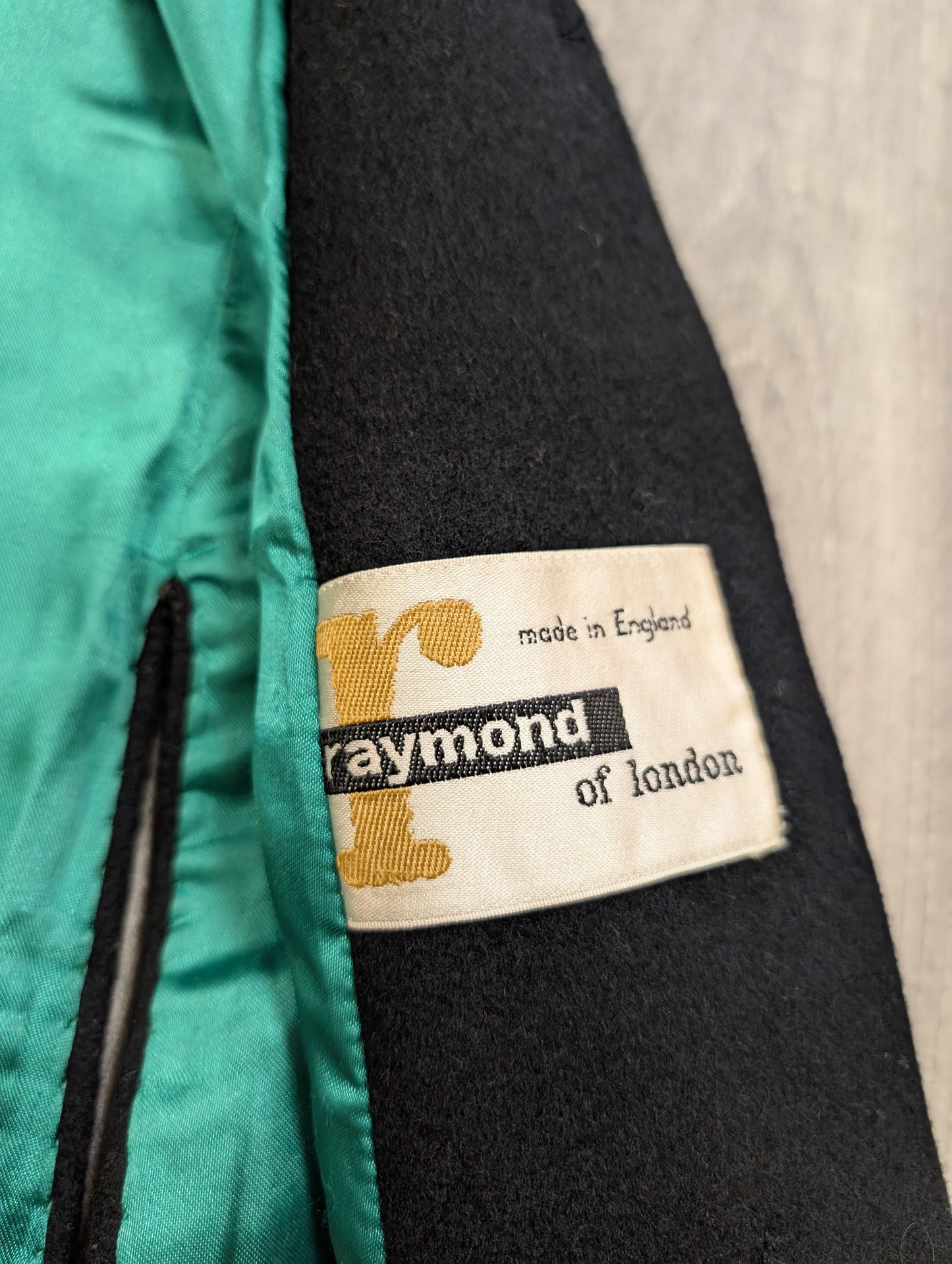 1960s Raymond of London black wool cape with fur trim